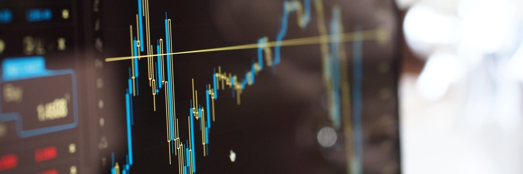 blue-and-yellow-graph-on-stock-market-monitor-159888