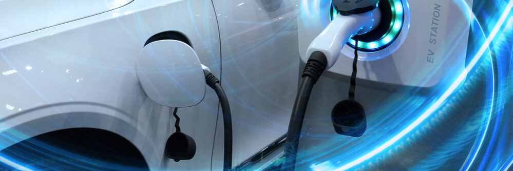 Ev,Car,Or,Electric,Vehicle,At,Charging,Station,With,The