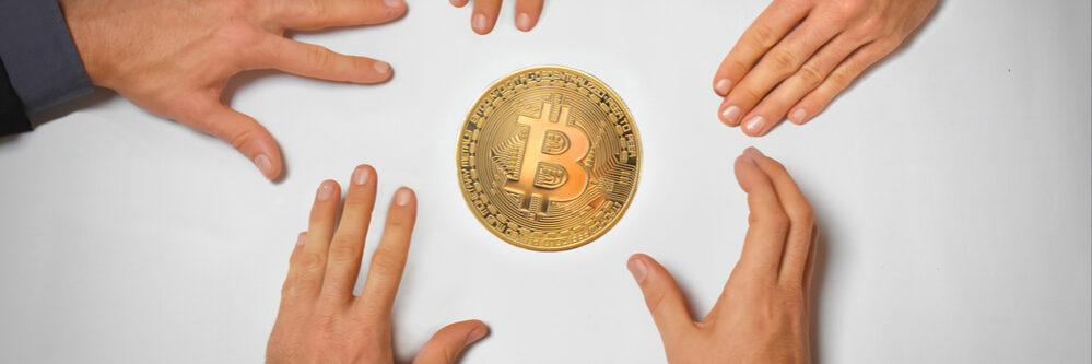 Concept,Of,A,New,Bitcoin,Hype,With,Five,Hands,Reaching