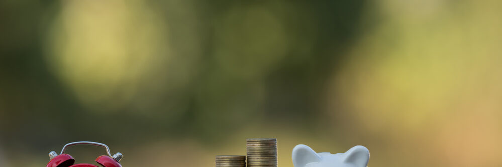 A,Piggy,Bank,Put,On,The,Stacking,Gold,Coins,And