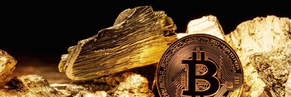 Coin,Bitcoin,Next,To,Pieces,Of,Gold