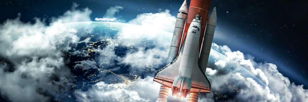 Space,Shuttle,In,The,Space,Near,Earth.,Clouds,And,Sky