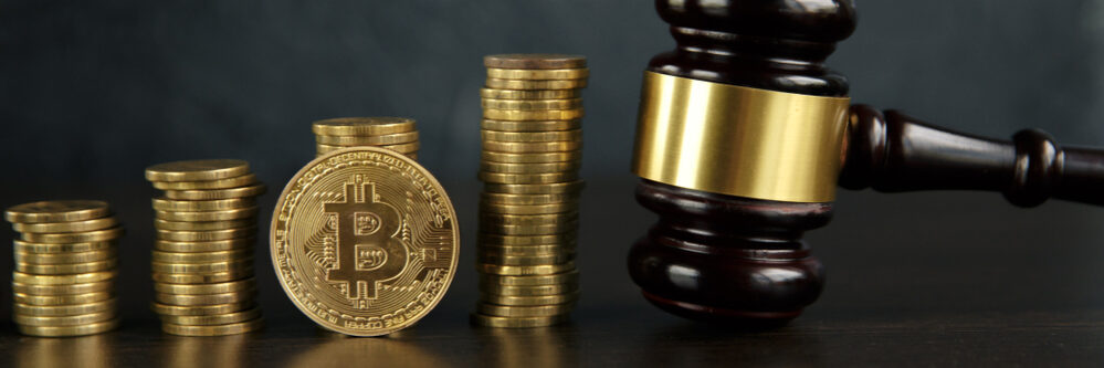 Auction,Gavel,And,Bitcoin,Cryptocurrency,Money,On,A,Wooden,Desk,