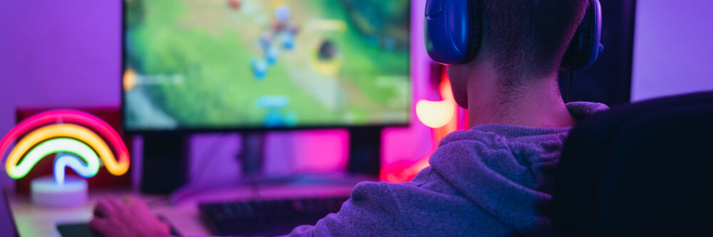 Young,Gamer,Playing,Online,Video,Games,While,Streaming,On,Social