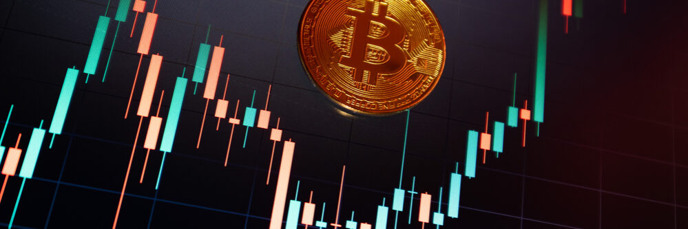 Bitcoin,Cryptocurrency,Coin,On,The,Background,Of,The,Exchange,Chart