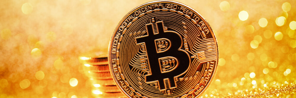 Bitcoin,Cryptocurrency,Coin,On,A,Golden,Glittery,Background,,Cryptocurrency,As