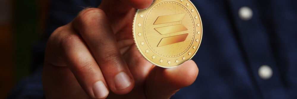 Solana,Altcoin,Cryptocurrency,Symbol,Golden,Coin,In,Hand,Abstract,Concept.