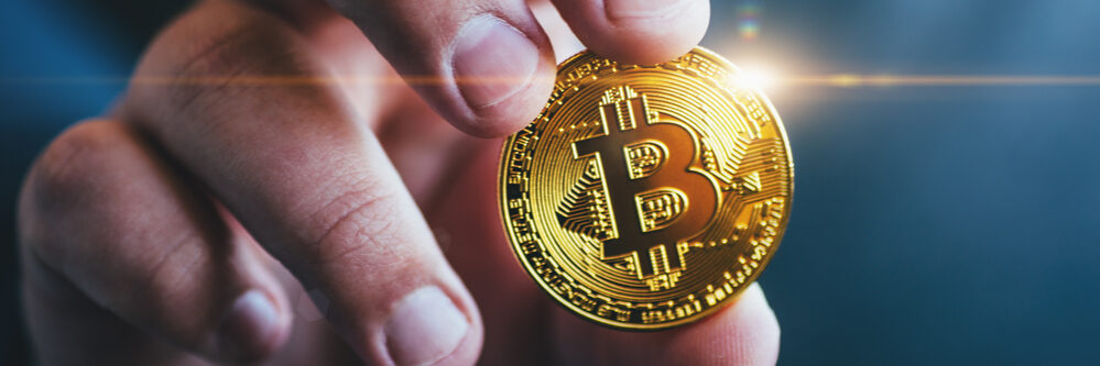 Cryptocurrency,Golden,Bitcoin,Coin,In,Man,Hand,-,Symbol,Of